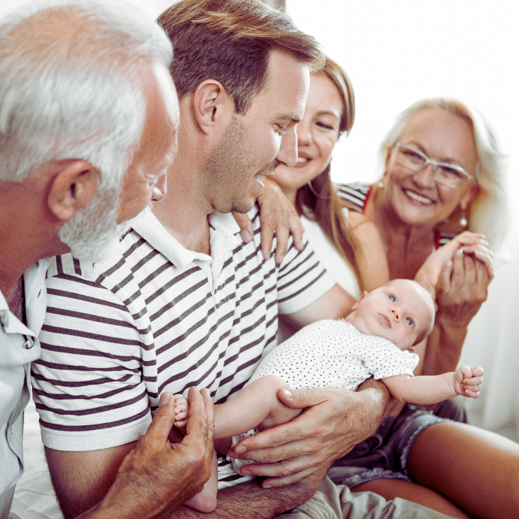 Happy family with baby, New Jersey life insurance by The Barclay Group – The Barclay Group