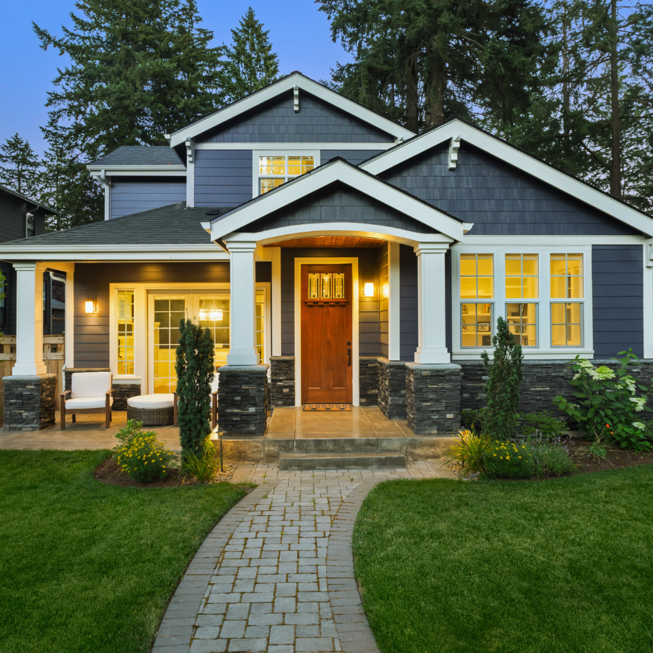Luxury NJ home with blue siding and stone accents needing homeowners insurance in New Jersey – The Barclay Group
